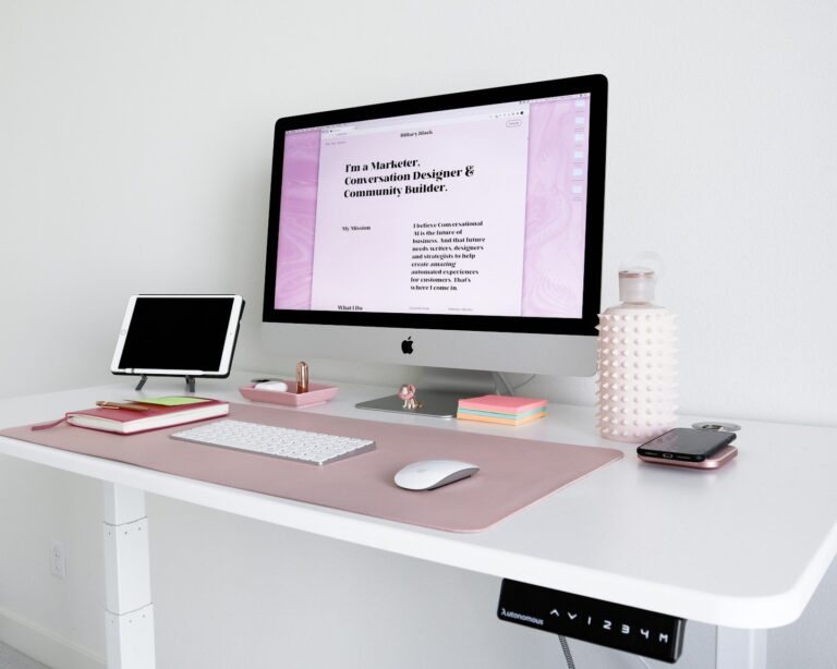 A modern fundraising website open on a laptop in a bright workspace, showing a branded donation platform for nonprofits.